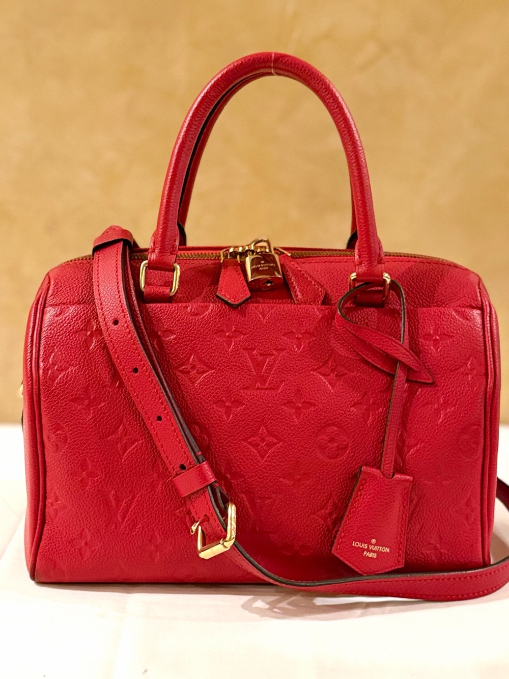 Louis Vuitton Monogram Empreinte Leather Speedy Bandouliere 25 NM Cerise